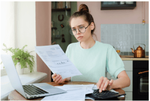 woman is calculating finance and taxes